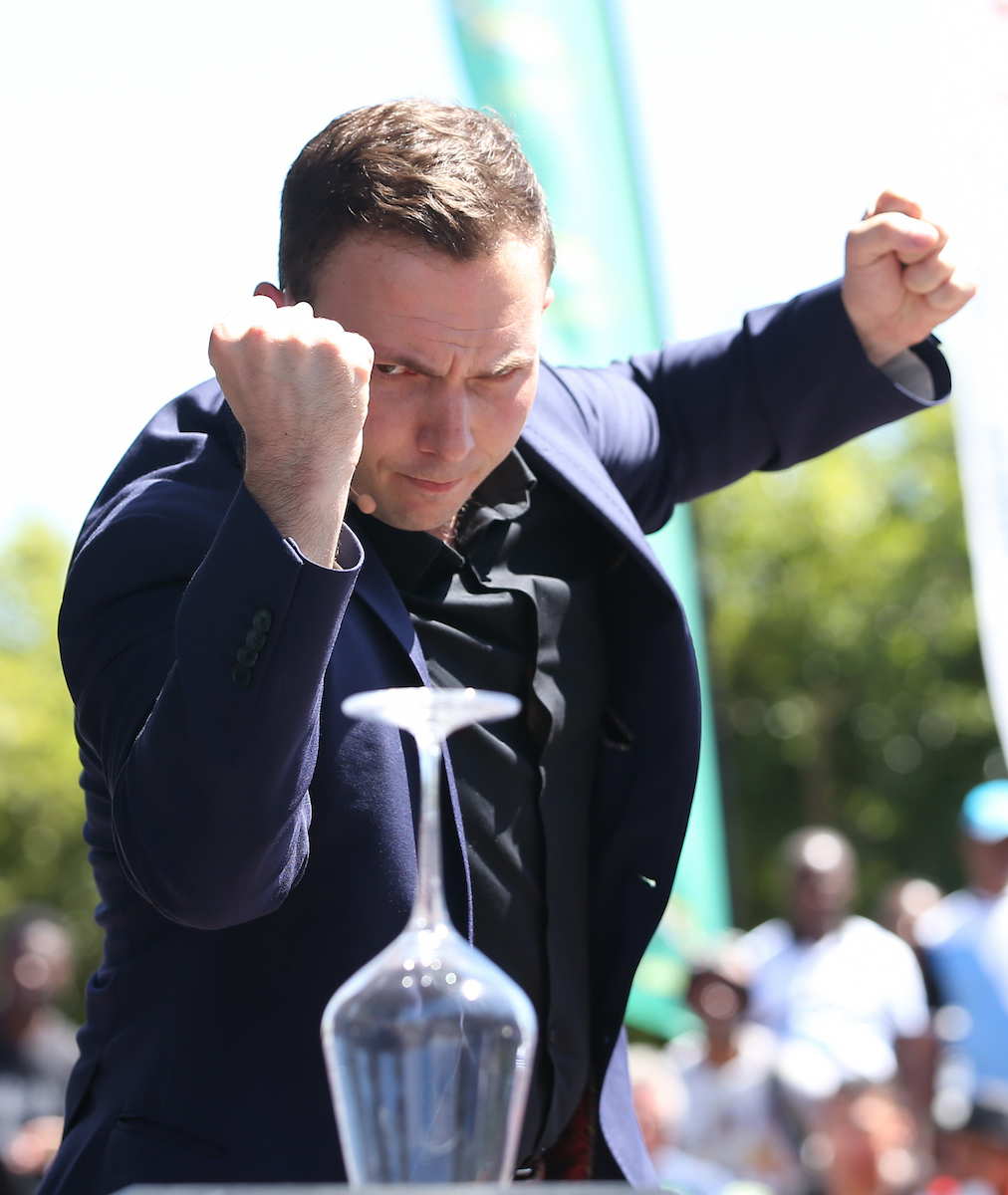 CAPE TOWN, SOUTH AFRICA - 7 December 2016, Larry Soffer performs his magic tricks during the Springbok 7's signing session at the V&A Waterfront ahead of the HSBC Cape Town 7's rugby tournament taking place at Cape Town Stadium on 10-11 December 2016.  (Photo by Roger Sedres/ImageSA)